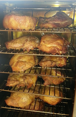 QF05: Quik-Fire six rack smoker loaded with protein